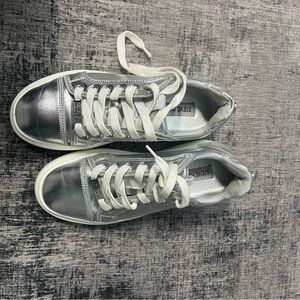 Steve Madden Galvanize silver sneaker.